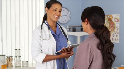 Doctor speaking to patient