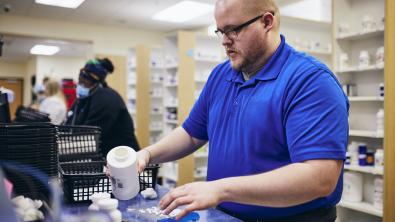 Pharmacy tech working in pharmacy